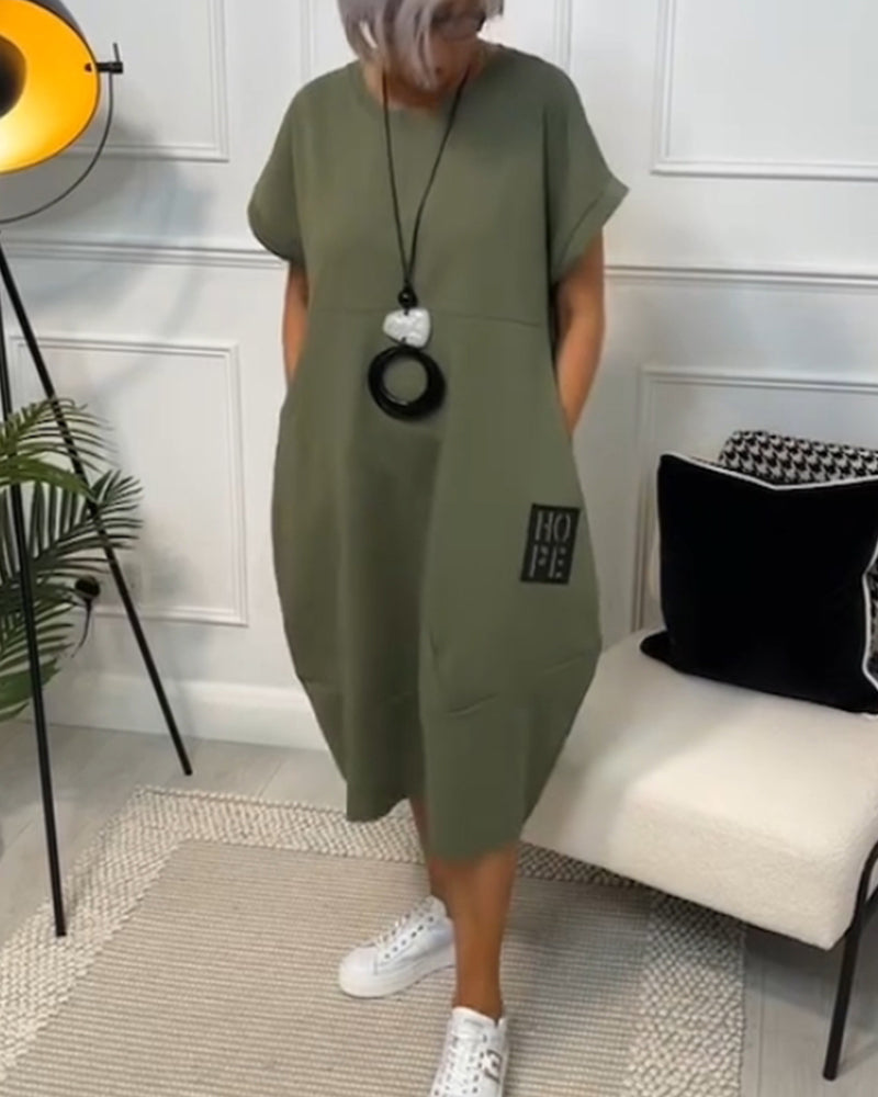 Elisa | Abito midi essenziale con tasche