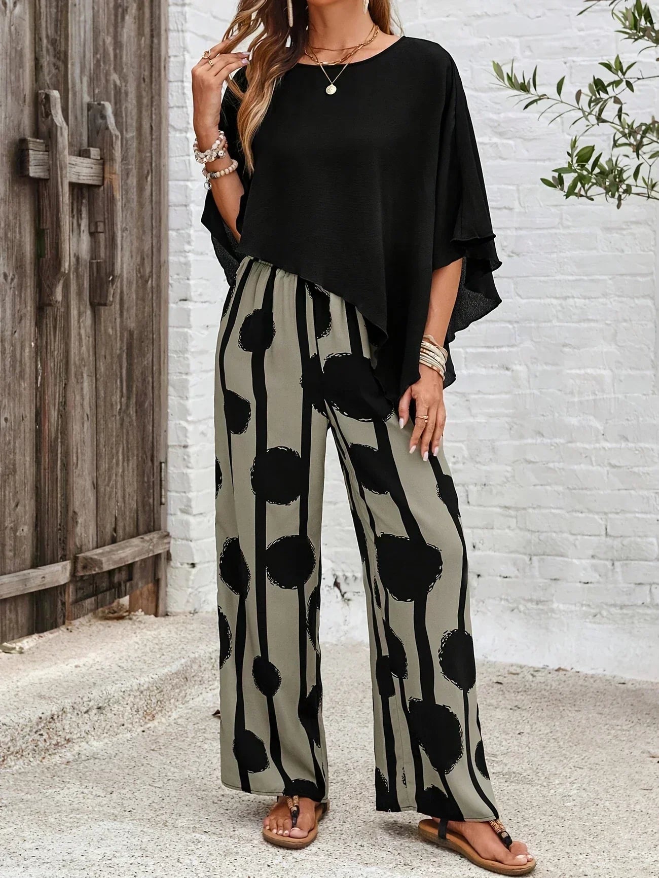 Sabrina | Completo fluido con pantaloni a pois artistici