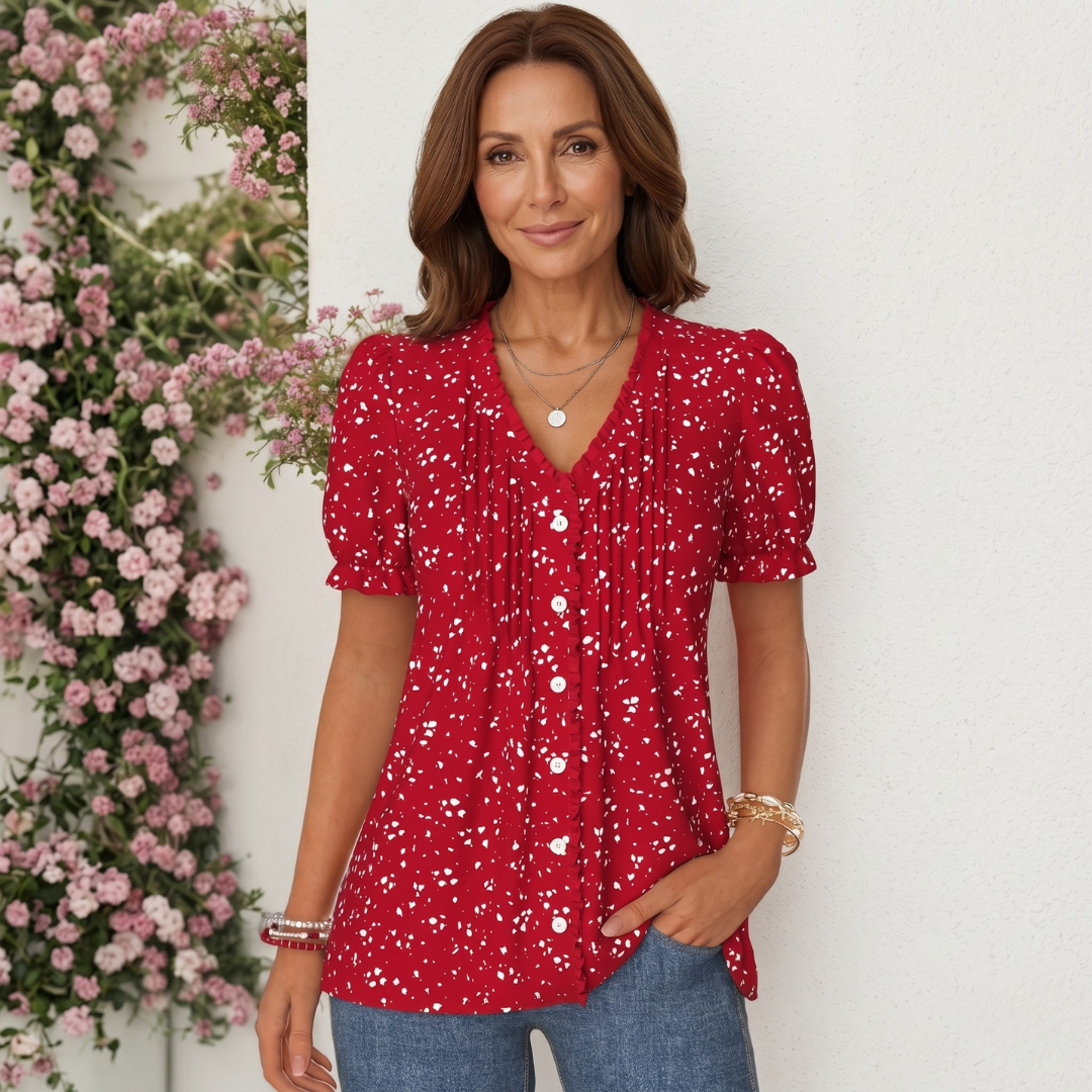 Rosanna | Blusa elegante a pois con bottoni decorativi
