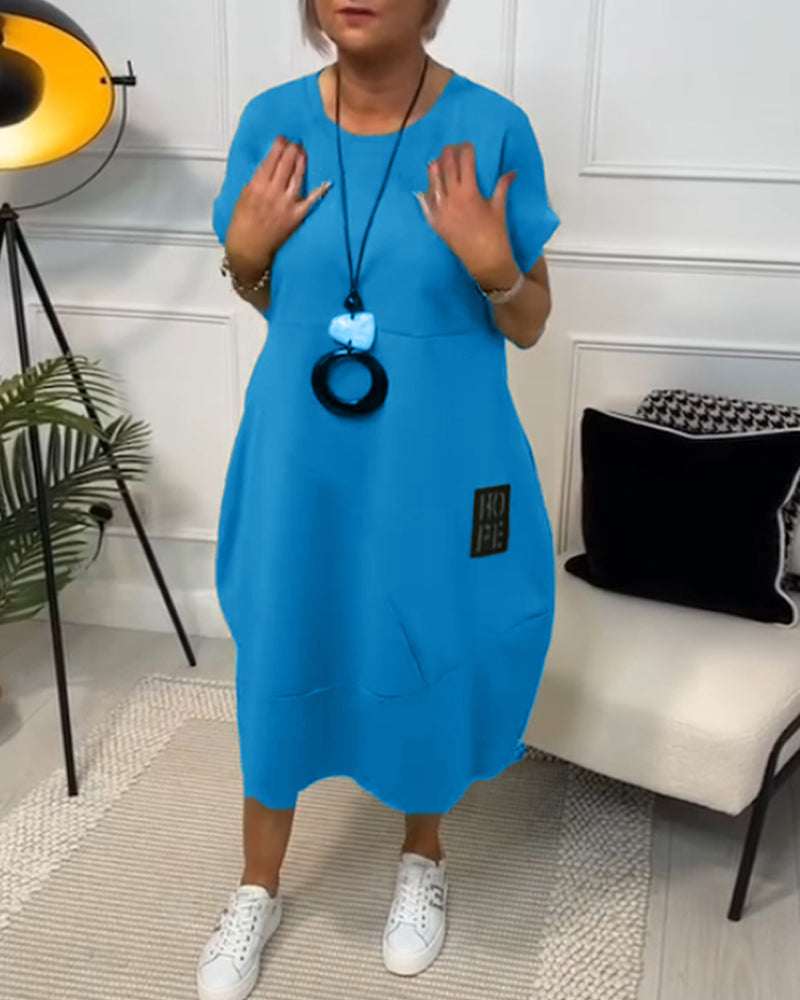 Elisa | Abito midi essenziale con tasche