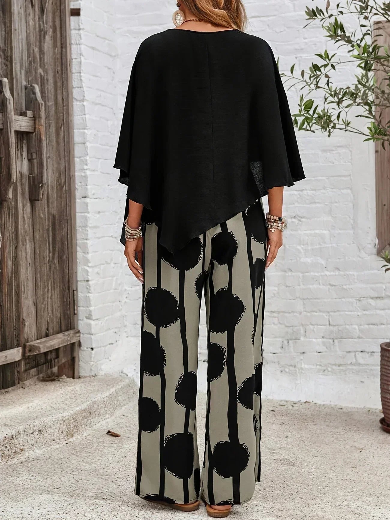 Sabrina | Completo fluido con pantaloni a pois artistici