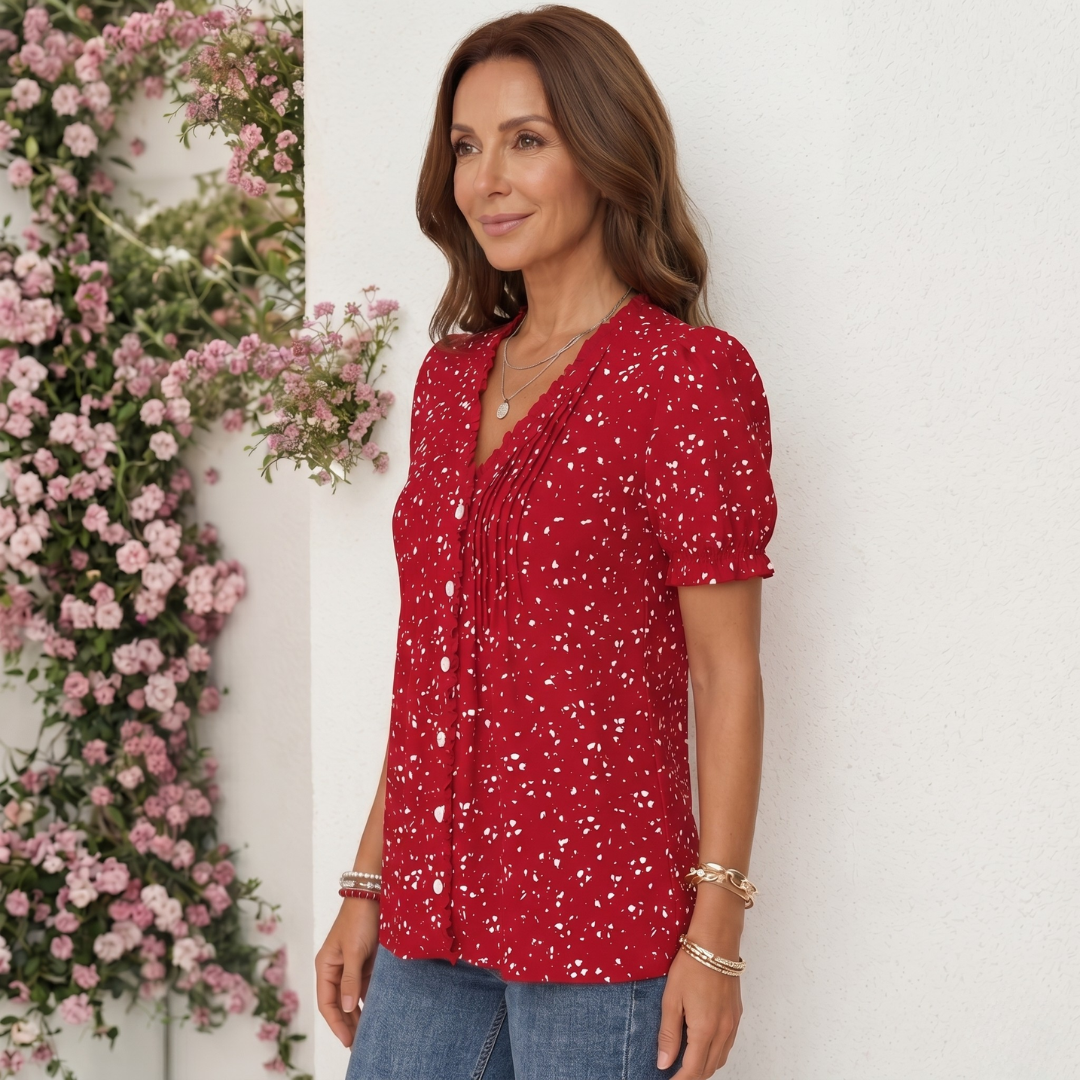 Rosanna | Blusa elegante a pois con bottoni decorativi