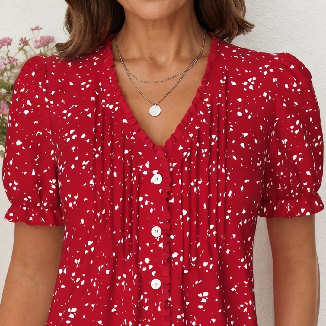 Rosanna | Blusa elegante a pois con bottoni decorativi