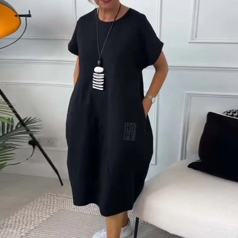 Elisa | Abito midi essenziale con tasche